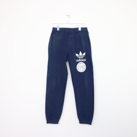 Vintage Adidas Originals joggers in navy blue and white. Best fits S