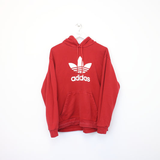 Vintage Adidas hoodie in red. Best fits L