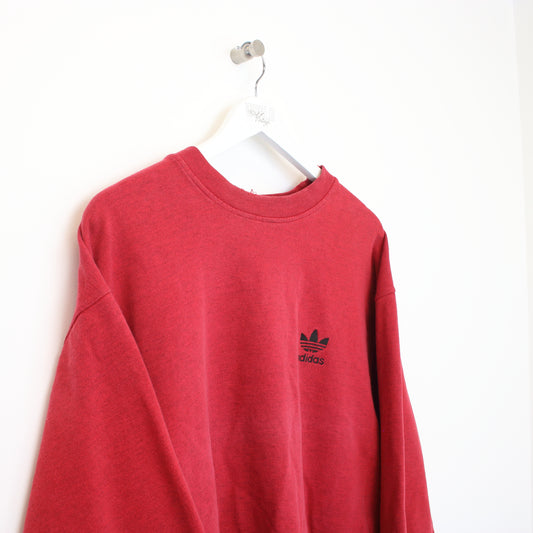 Vintage Adidas originals sweatshirt in red. Best fits L