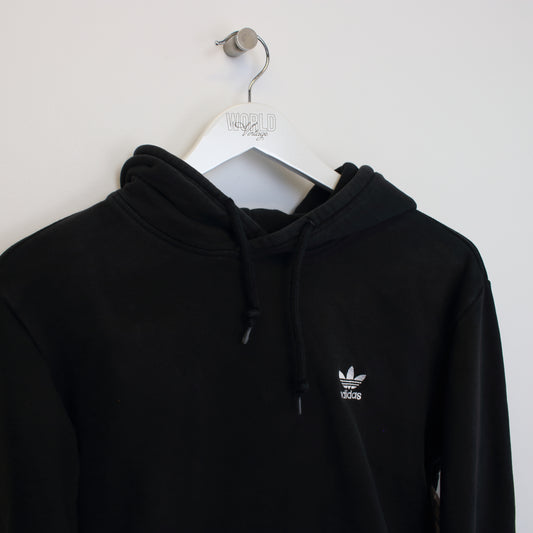 Vintage Adidas hoodie in black. Best fits S