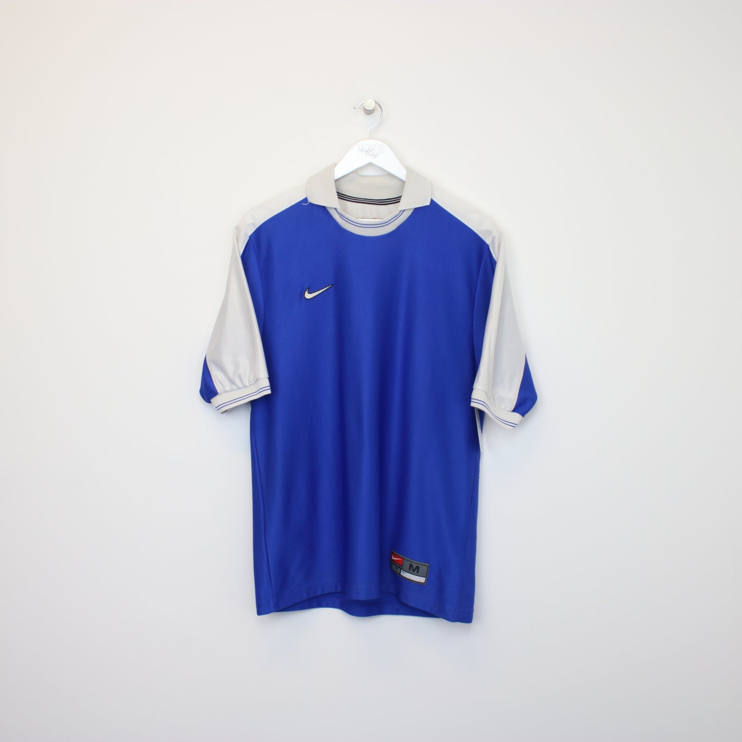 Vintage Nike training football shirt in blue and white. Best fits M