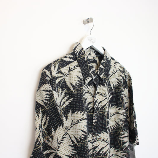 Vintage Axis hawaiian shirt in black, white and brown. Best fits XL