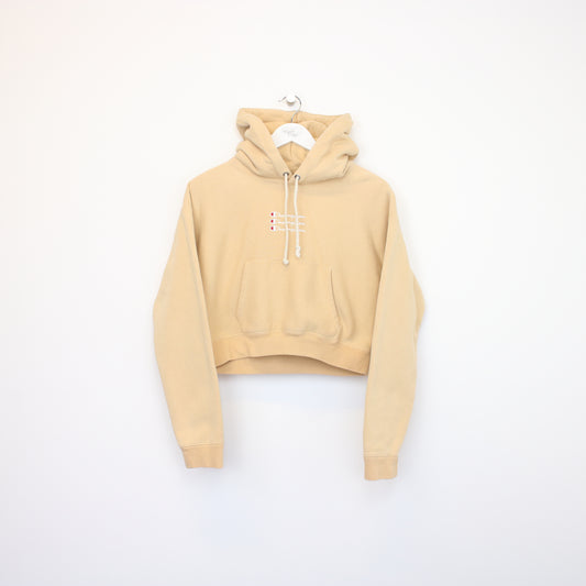 Vintage women's Champion cropped hoodie in beige. Best fits M