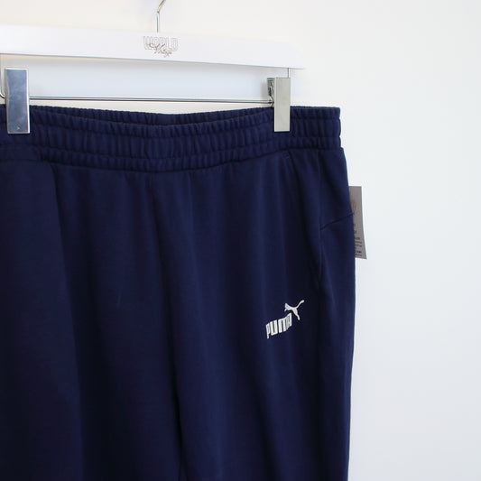 Vintage Puma joggers in blue. Best fits L