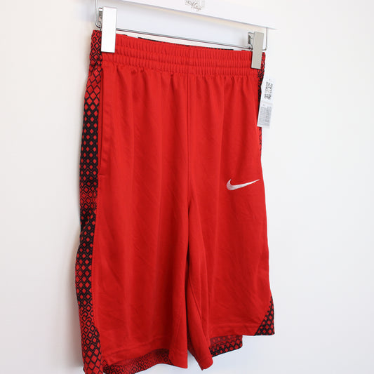 Vintage Nike shorts in red and black. Best fits M