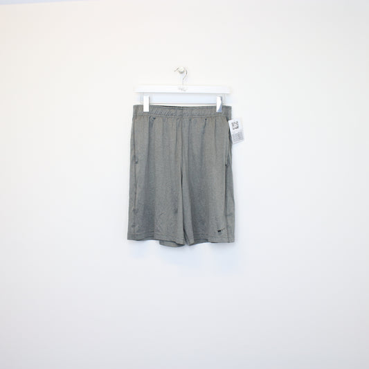 Vintage Nike shorts in grey. Best fits L