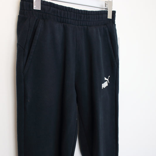 Vintage Puma joggers in black. Best fits S