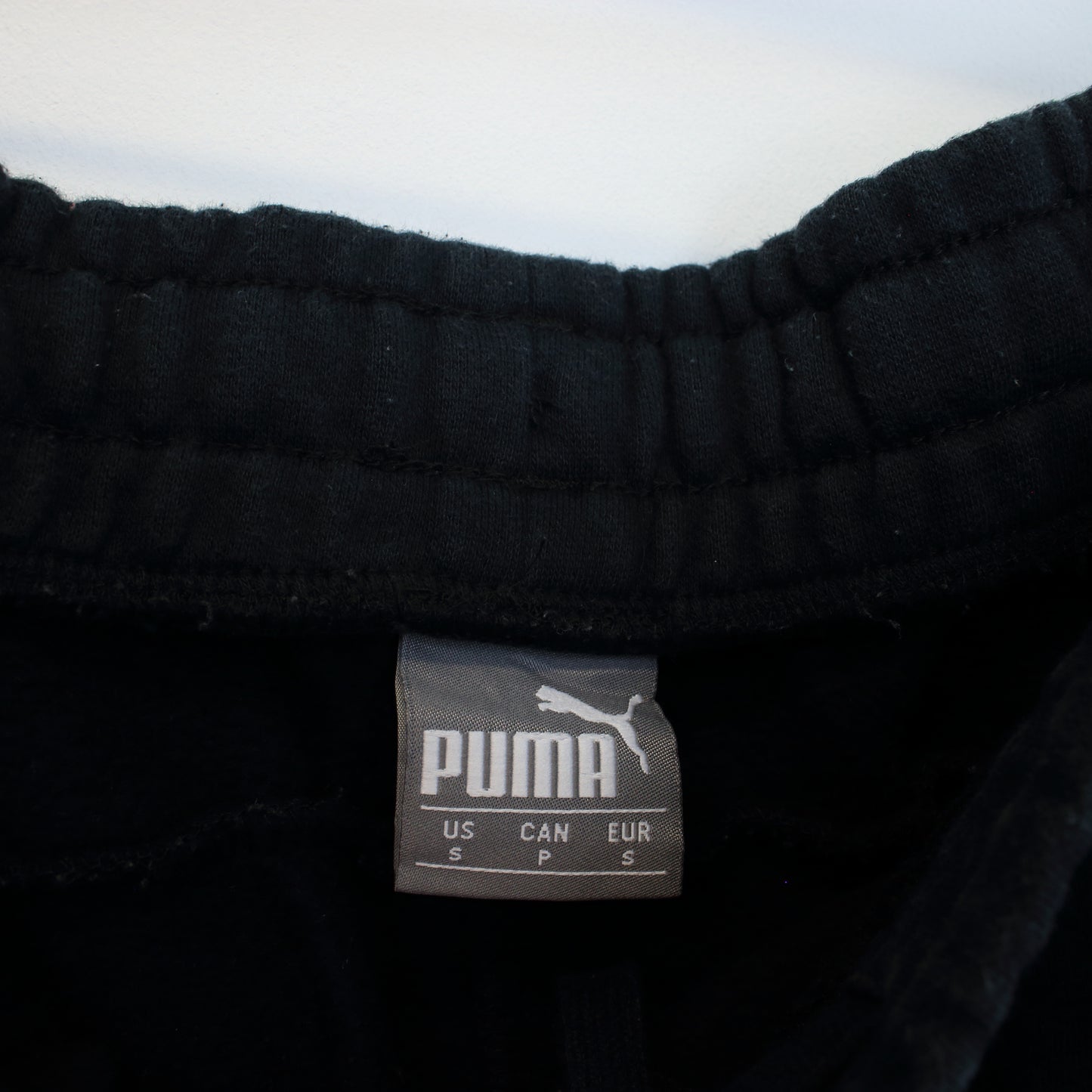 Vintage Puma joggers in black. Best fits S