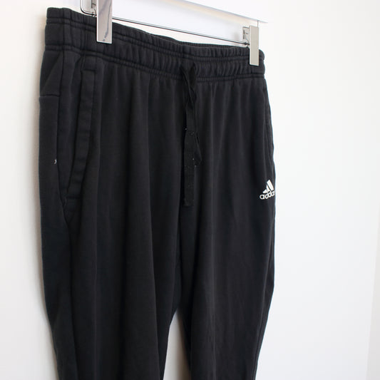 Vintage Women's Adidas joggers in black. Best fits M