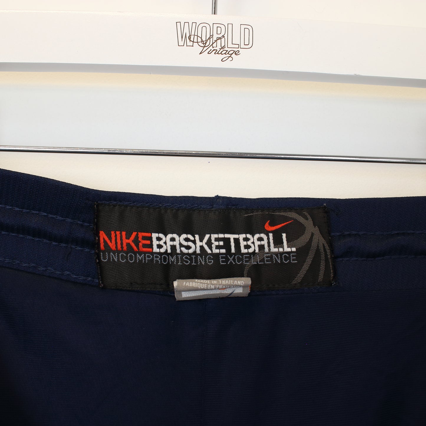 Vintage Nike basketball shorts in blue and orange. Best fits L