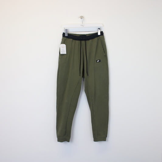 Vintage Nike Joggers in green. Best fit M