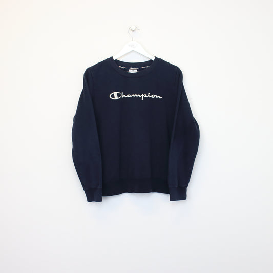 Vintage Champion women's sweatshirt in blue. Best fit S