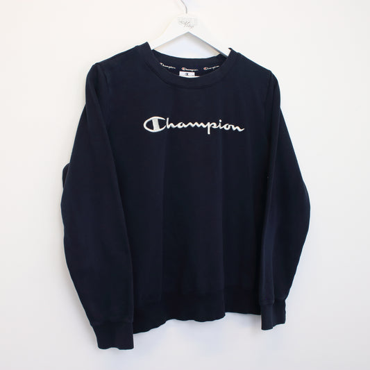 Vintage Champion women's sweatshirt in blue. Best fit S