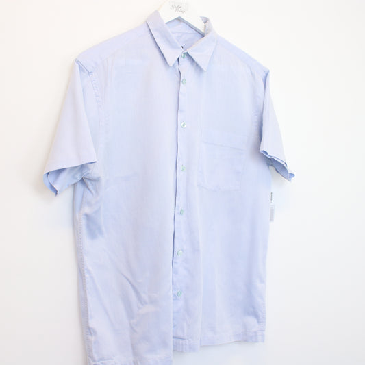 Vintage Kenzo shirt in light blue. Best fit M