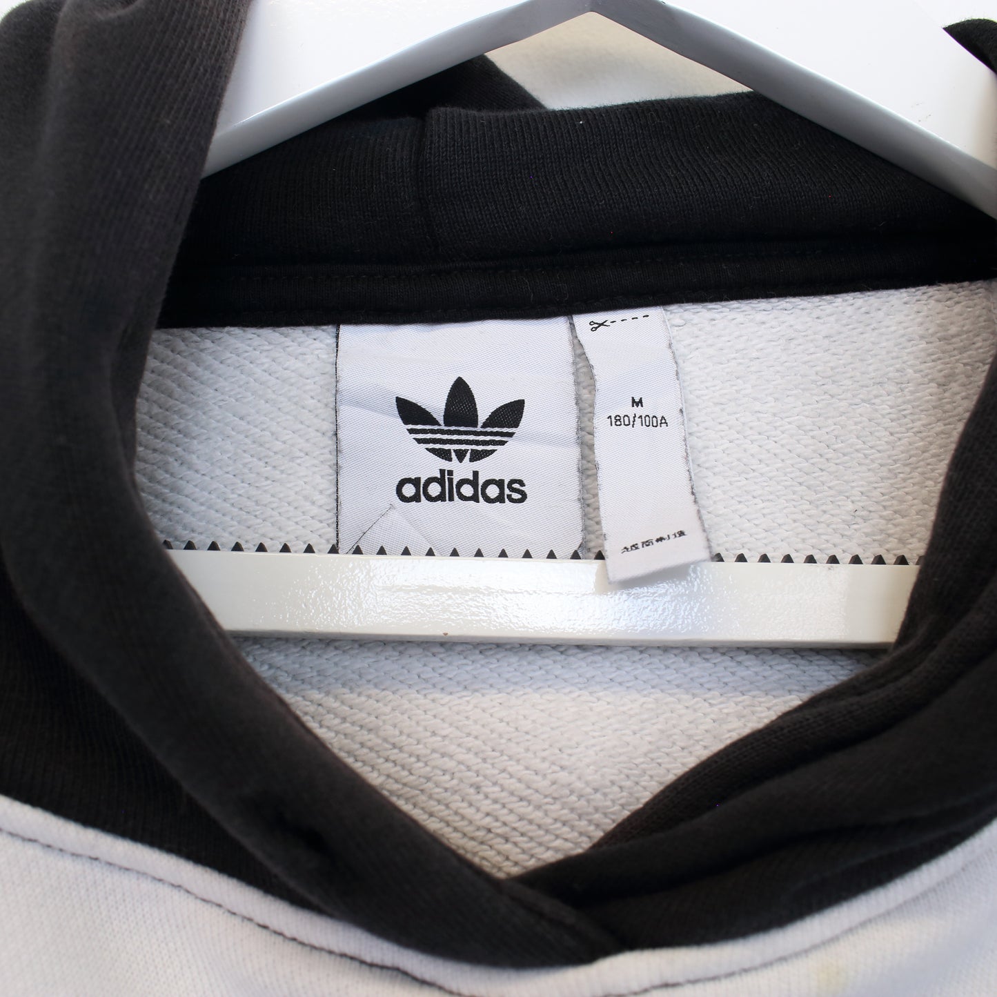 Vintage Adidas hoodie in black and white. Best fit M