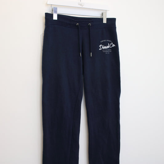 Vintage Women's Diesel joggers in navy blue. Best fit M