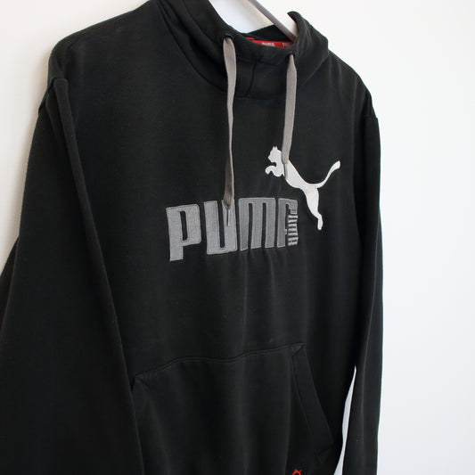 Vintage Puma hoodie in black. Best fits S