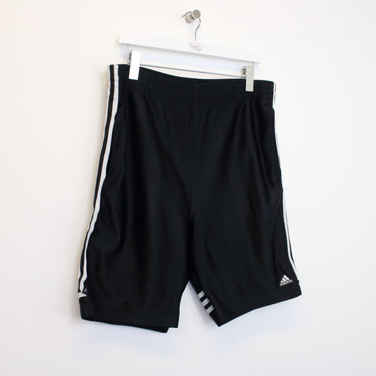 Vintage Adidas shorts in black and white. Best fits XL