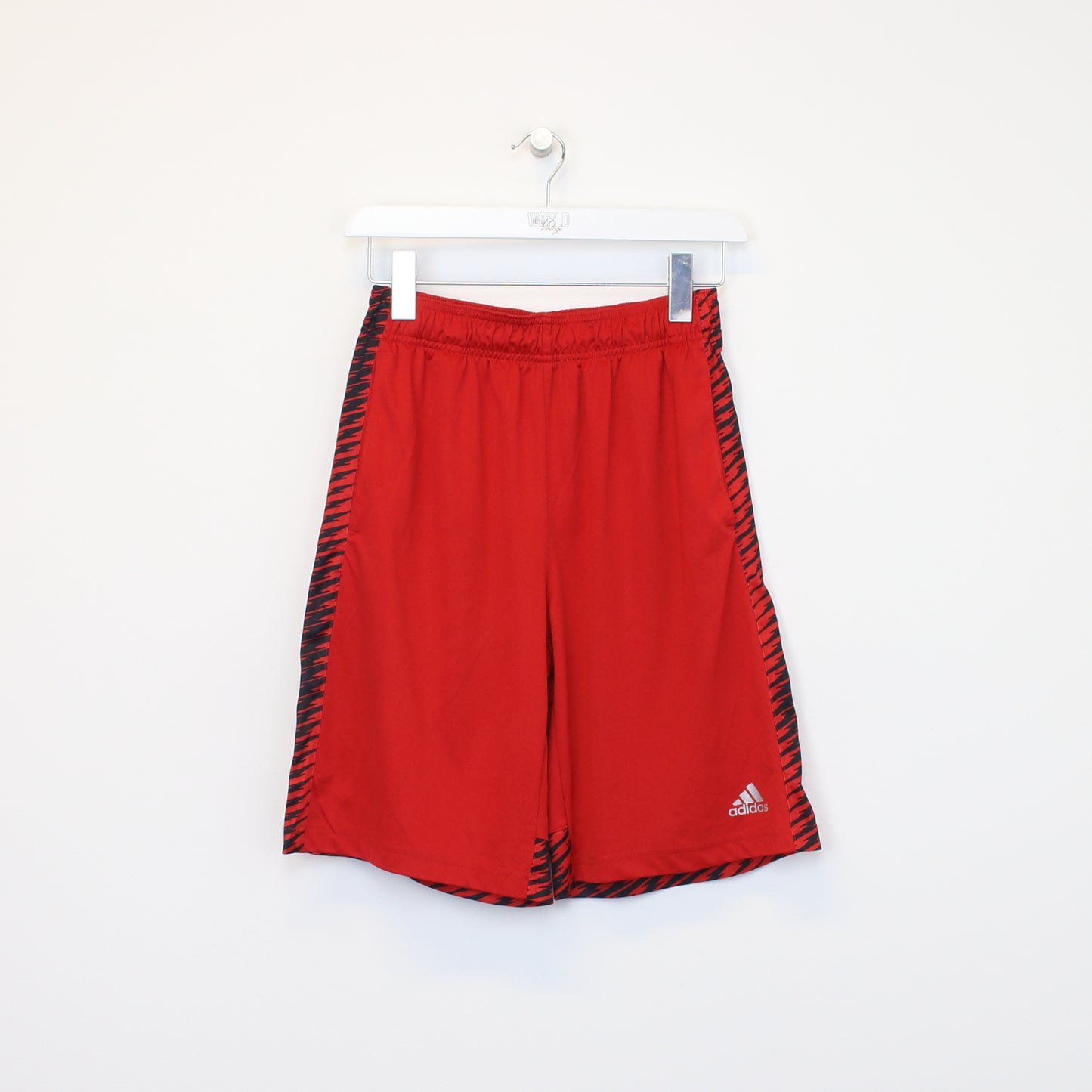 Vintage Adidas shorts in red and black. Best fits L