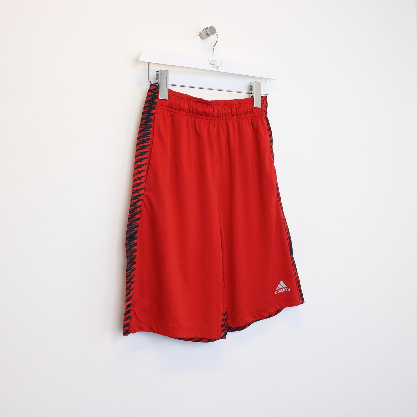 Vintage Adidas shorts in red and black. Best fits L