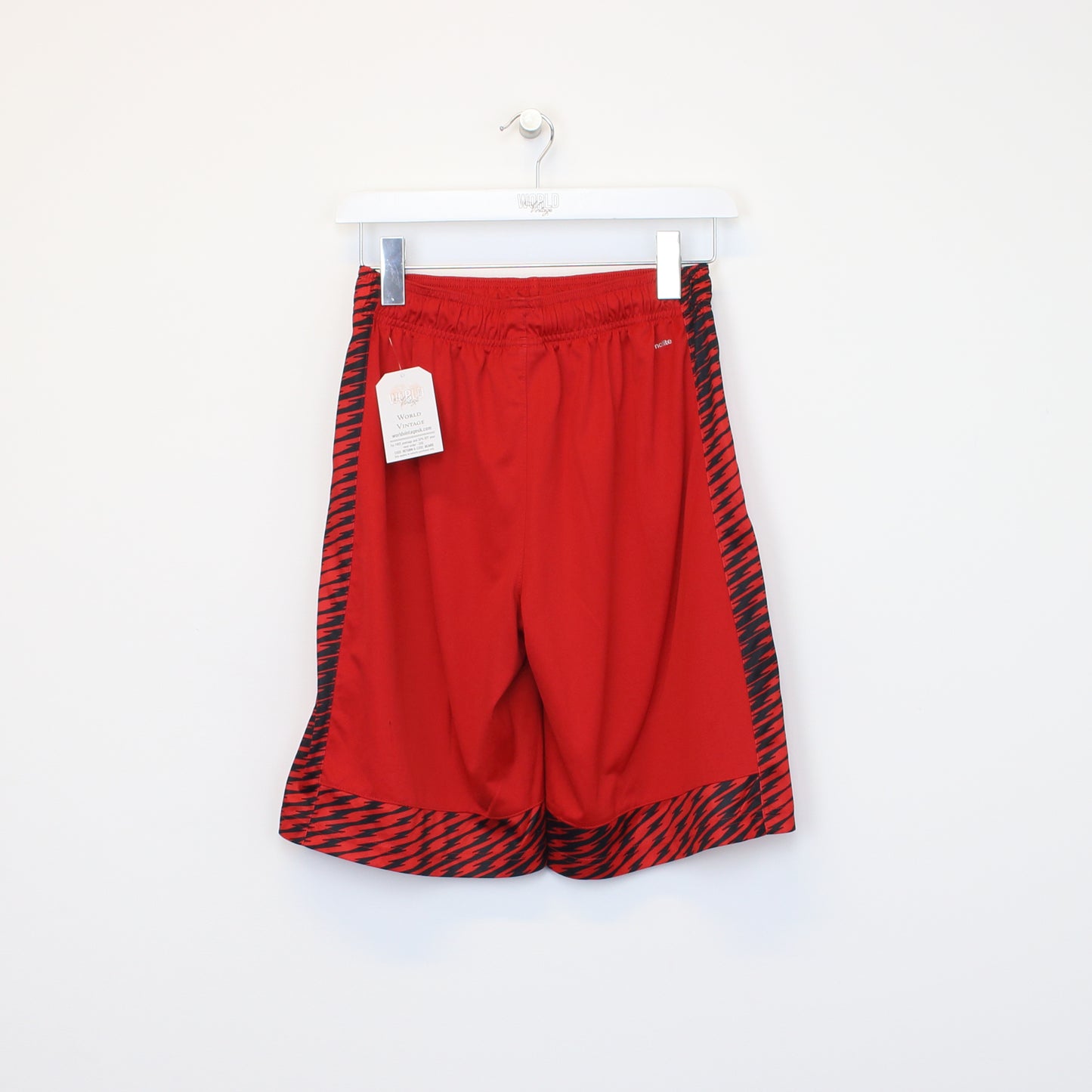 Vintage Adidas shorts in red and black. Best fits L