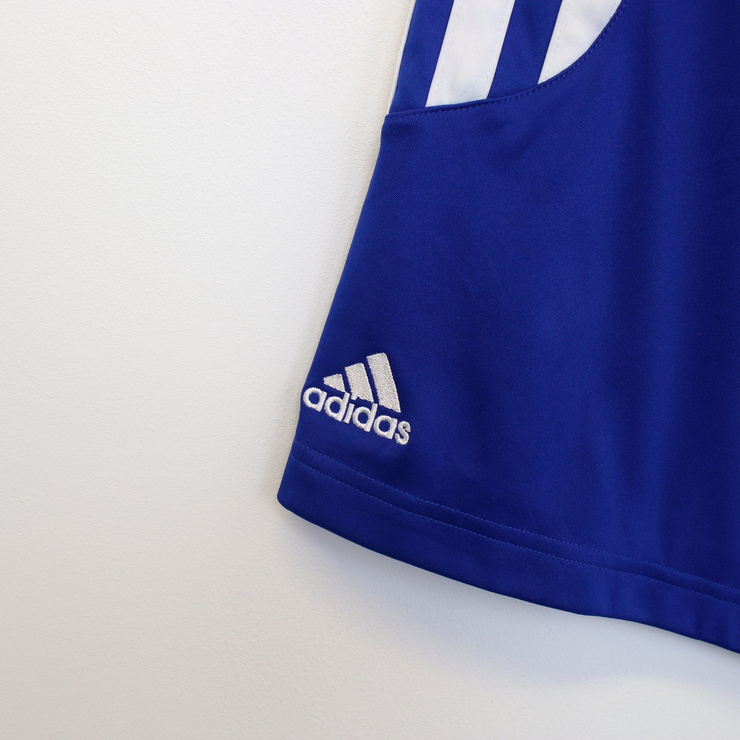 Vintage Adidas shorts in blue and white. Best fits M