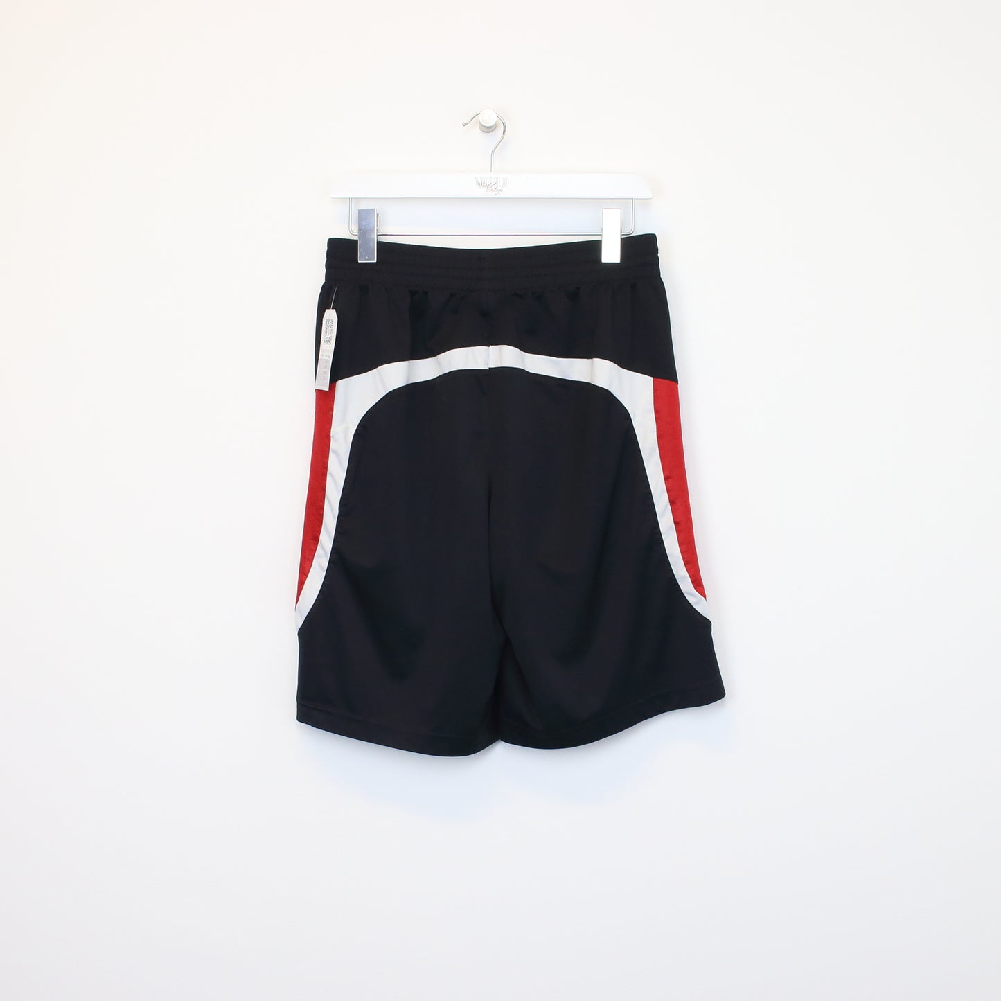 Vintage Adidas shorts in red and black. Best fits M