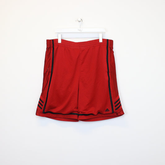 Vintage Adidas shorts in red and black. Best fits XXL