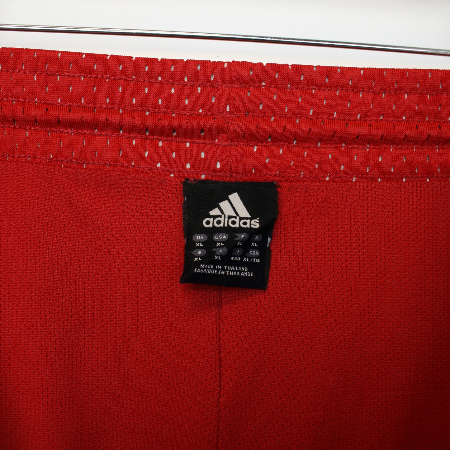 Vintage Adidas shorts in red and black. Best fits XXL