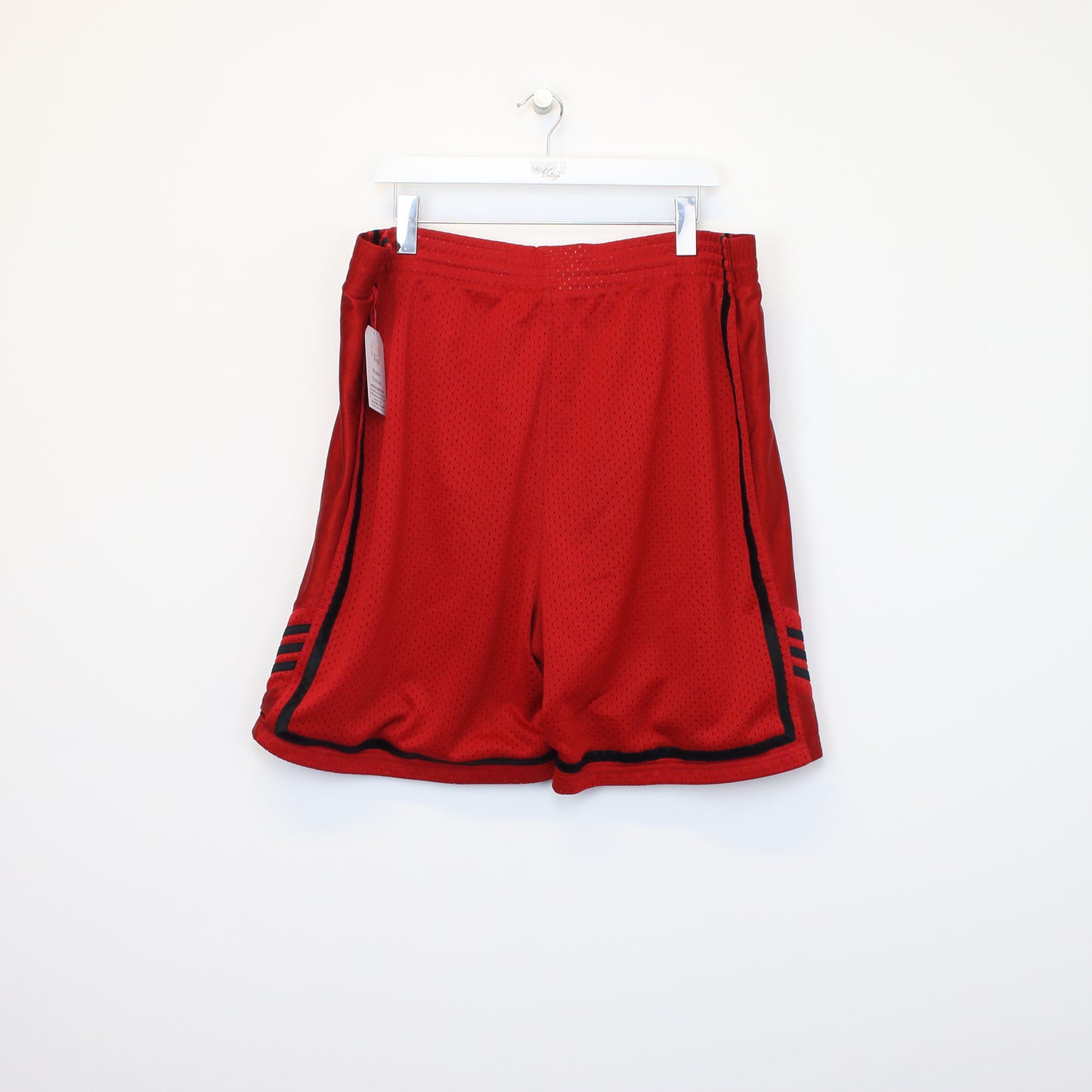 Vintage Adidas shorts in red and black. Best fits XXL