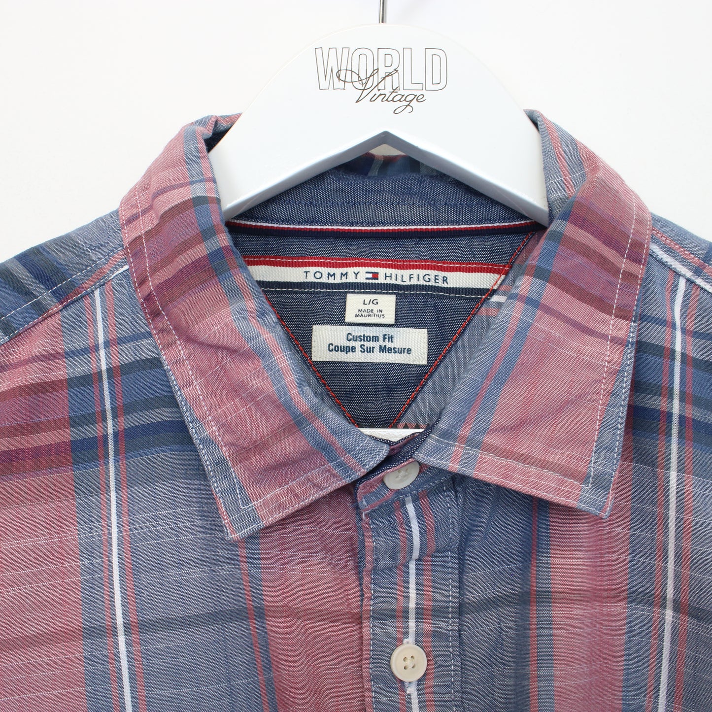 Vintage Tommy Hilfiger shirt in stripped red and blue. Best fits L