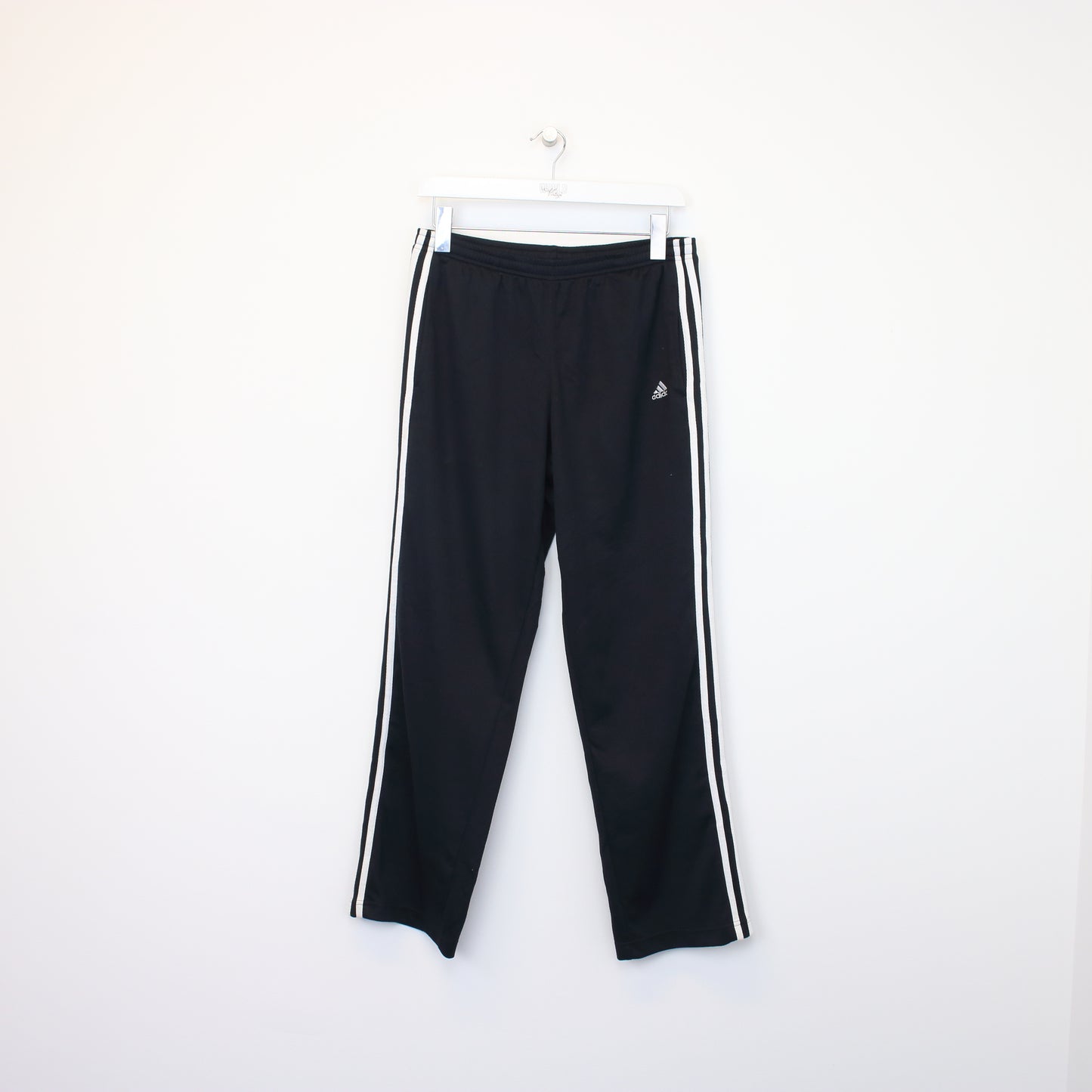 Vintage Adidas joggers in black and white. Best fits M