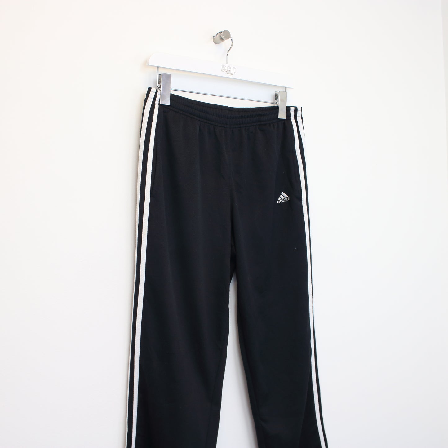 Vintage Adidas joggers in black and white. Best fits M