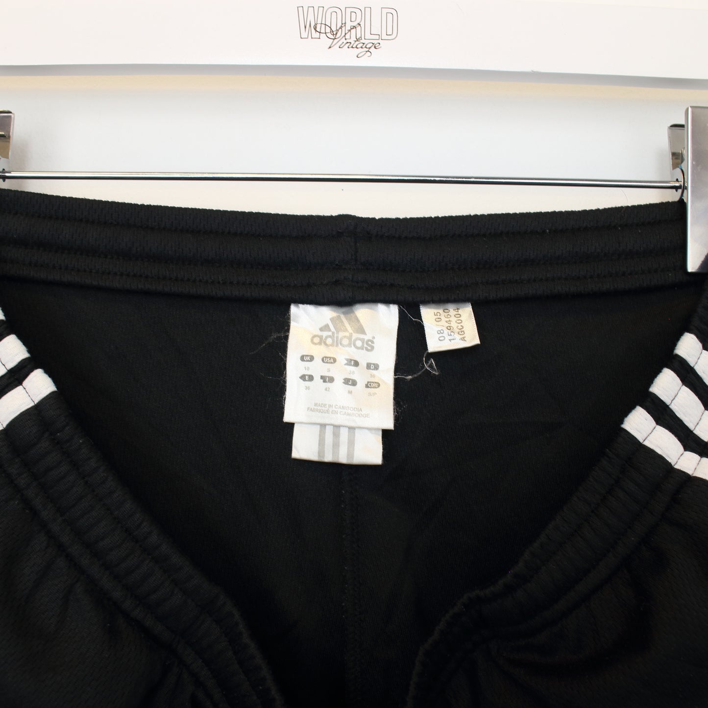 Vintage Adidas joggers in black and white. Best fits M