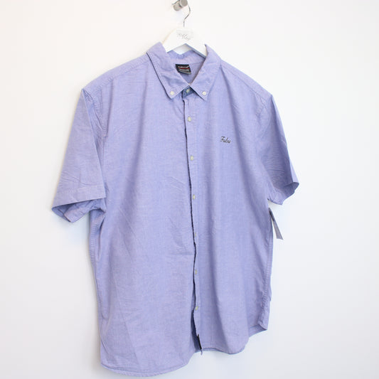 Vintage Fubu shirt in blue. Best fits M