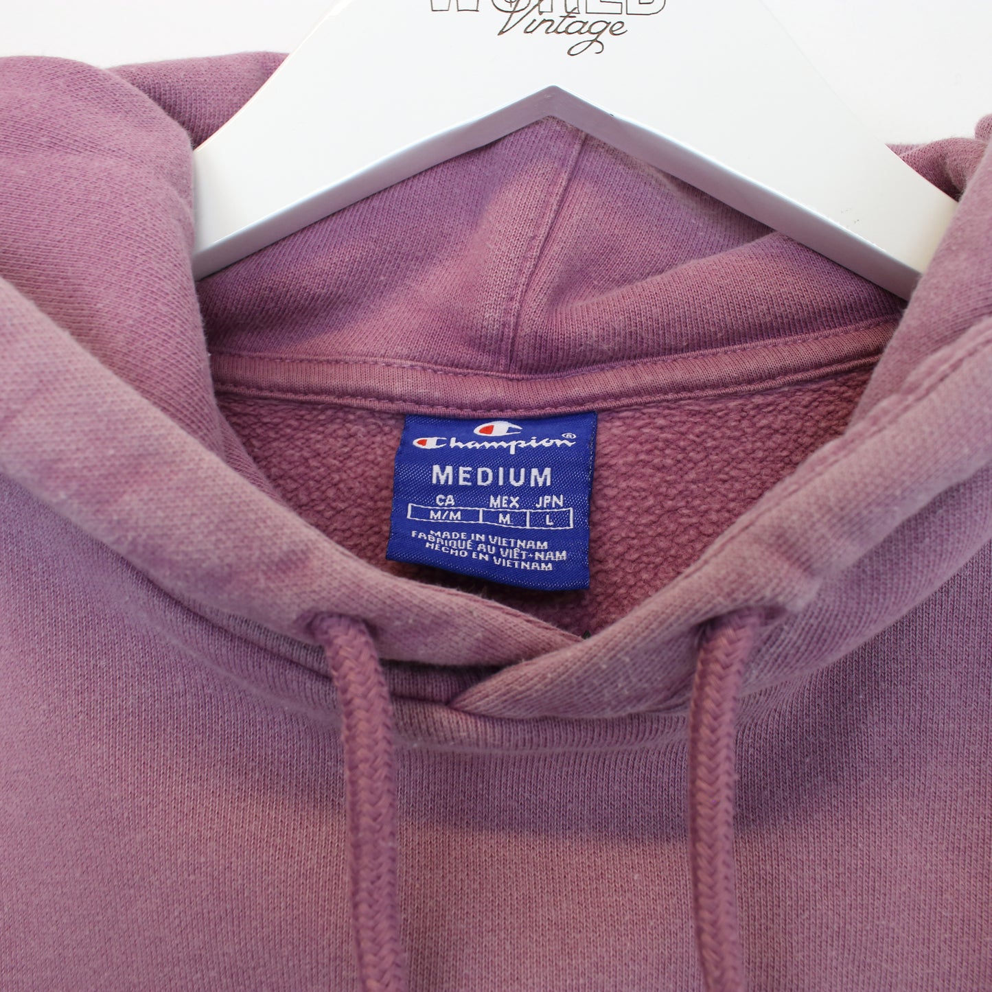 Vintage women's Champion hoodie in purple. Best fits M