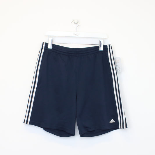 Vintage Adidas shorts in blue. Best fits XL