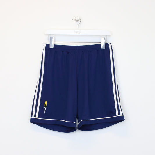 Vintage Adidas shorts in blue. Best fits L