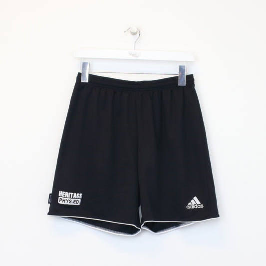 Vintage Adidas shorts in black. Best fits L