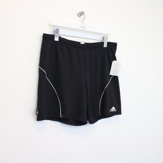 Vintage Adidas shorts in black. Best fits M