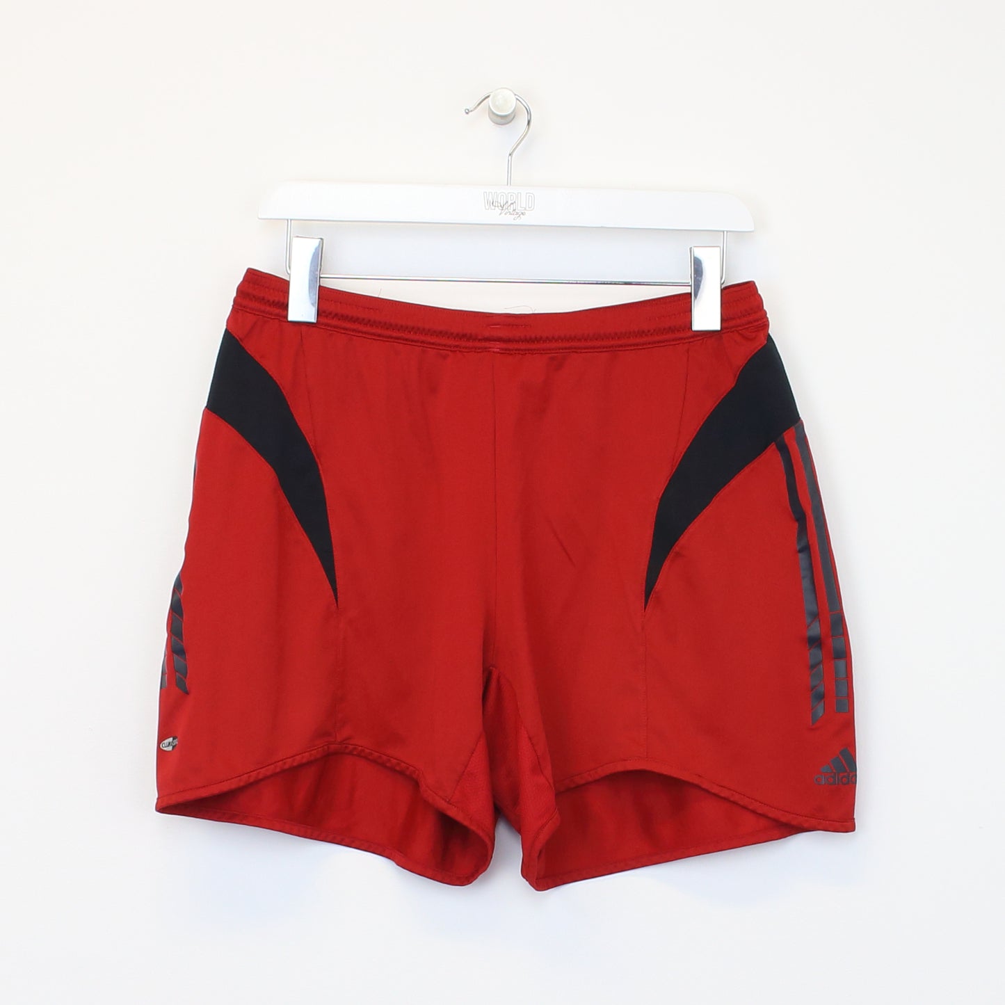 Vintage Adidas shorts in red. Best fits L