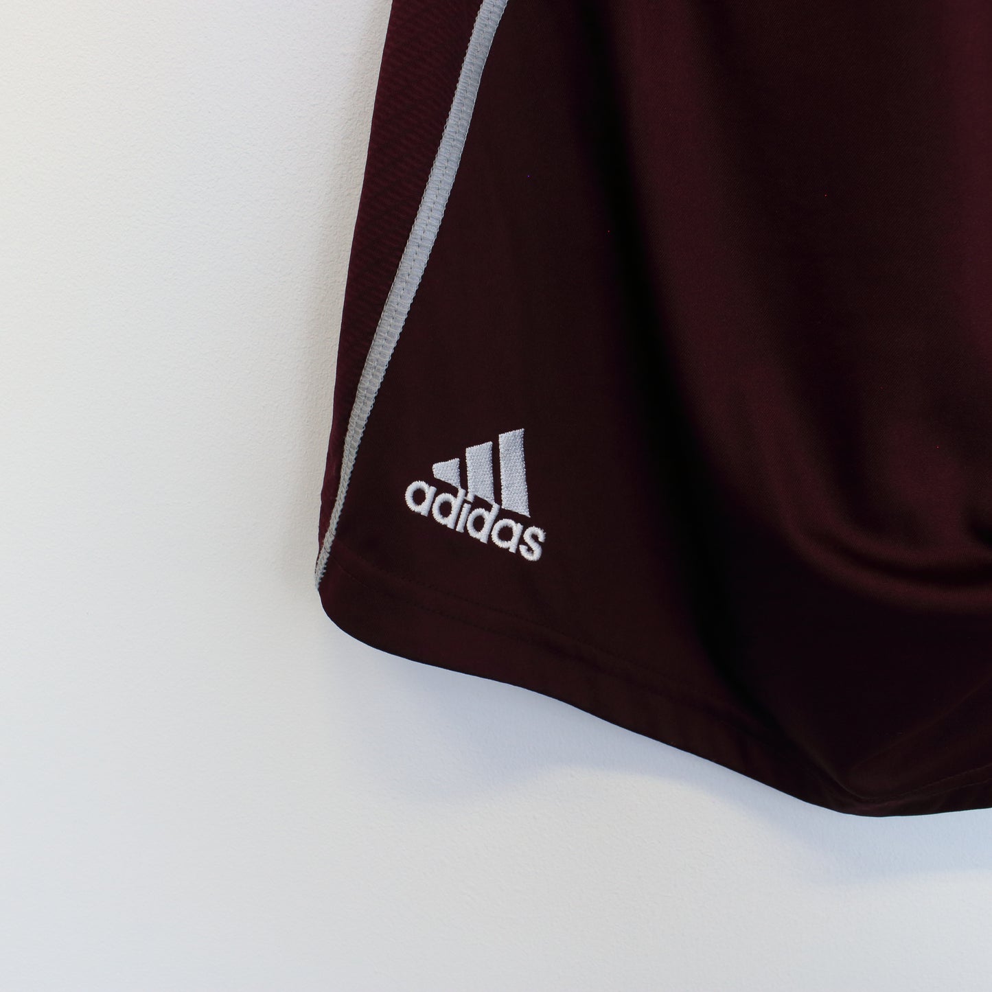 Vintage Adidas football shorts in burgundy. Best fits L