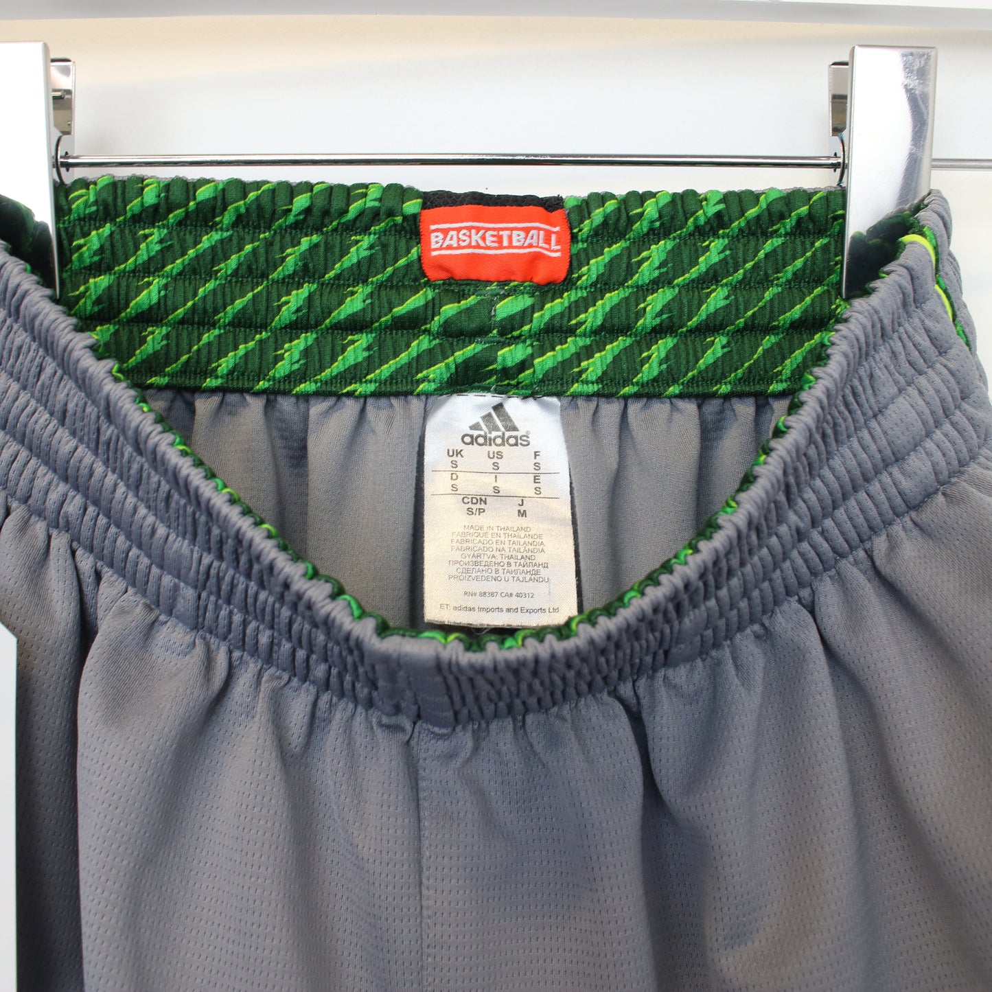 Vintage Adidas shorts in grey and green. Best fits S