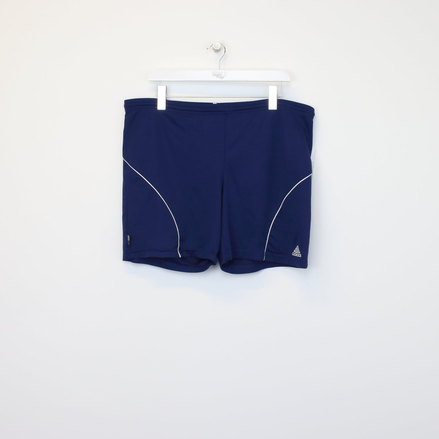 Vintage Adidas shorts in blue and white. Best fits XXL