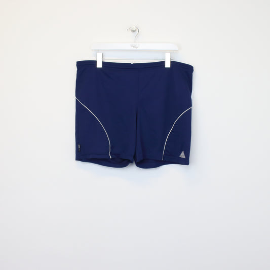 Vintage Adidas shorts in blue and white. Best fits XXL