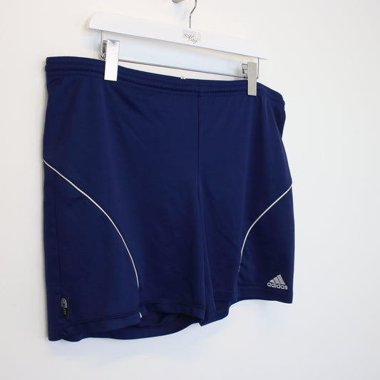 Vintage Adidas shorts in blue and white. Best fits XXL