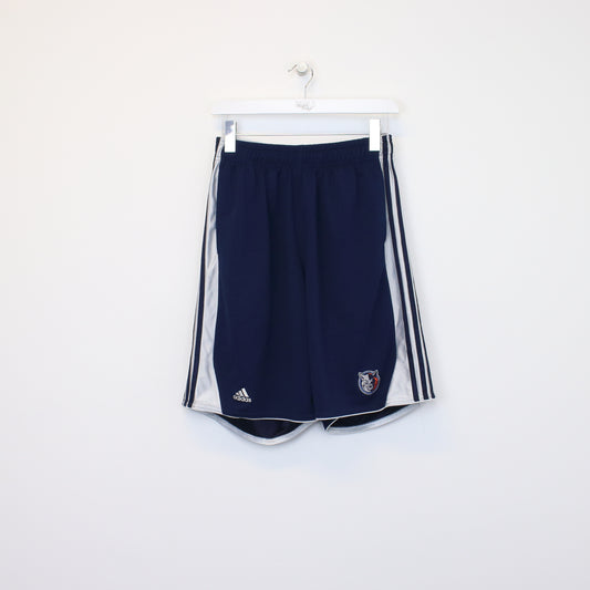 Vintage Adidas shorts in blue and white. Best fits L