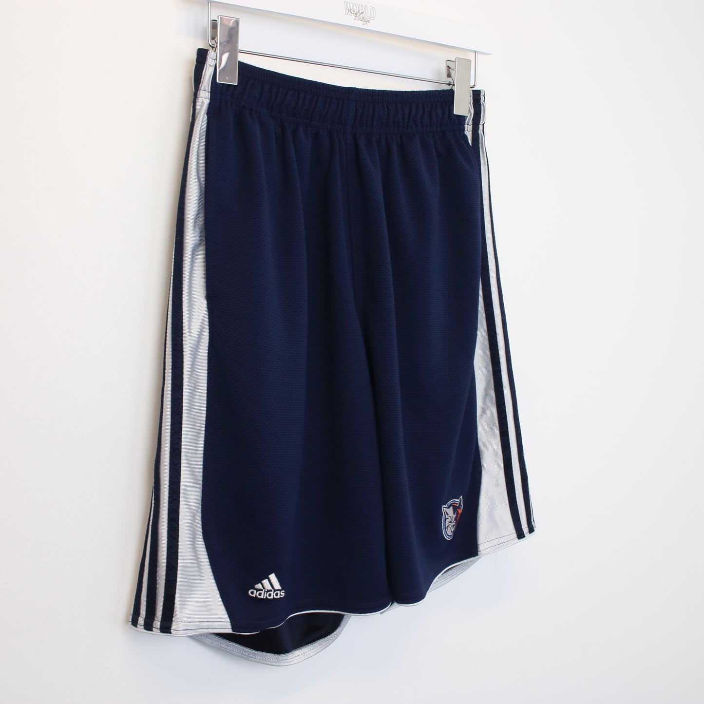 Vintage Adidas shorts in blue and white. Best fits L