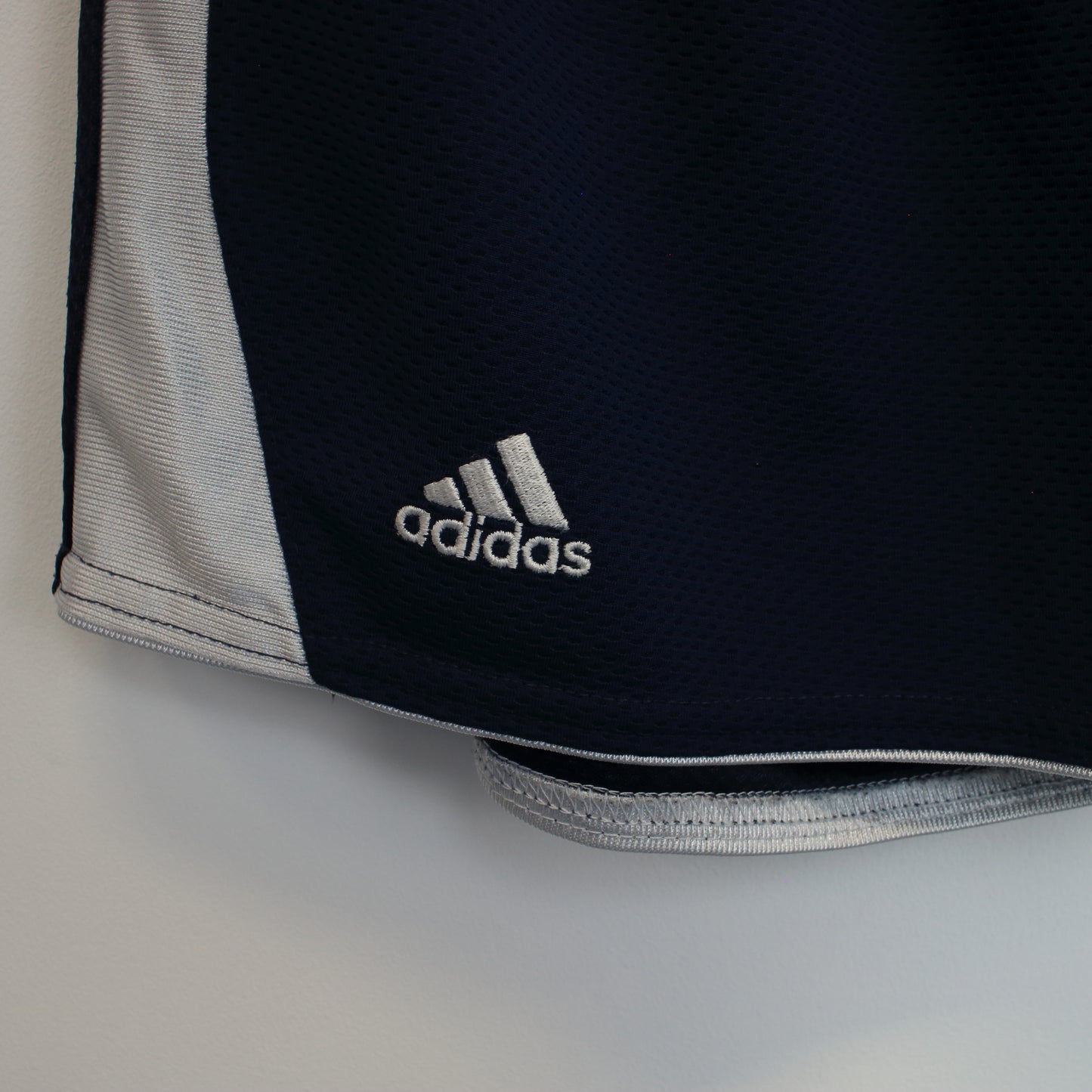 Vintage Adidas shorts in blue and white. Best fits L