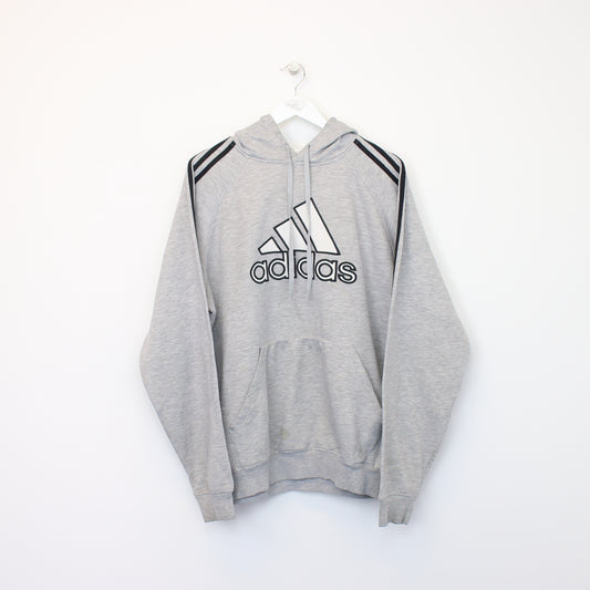 Vintage Adidas hoodie in grey. Best fits L